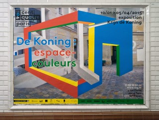 Krij de Koning exhibition poster in the metro corridors in Paris